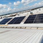 Solar installation on a business rooftop. Spenomatic Solar Home Solutions offers exceptional Small Business Solar Solutions